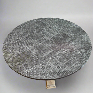 Round stone table on a plain background