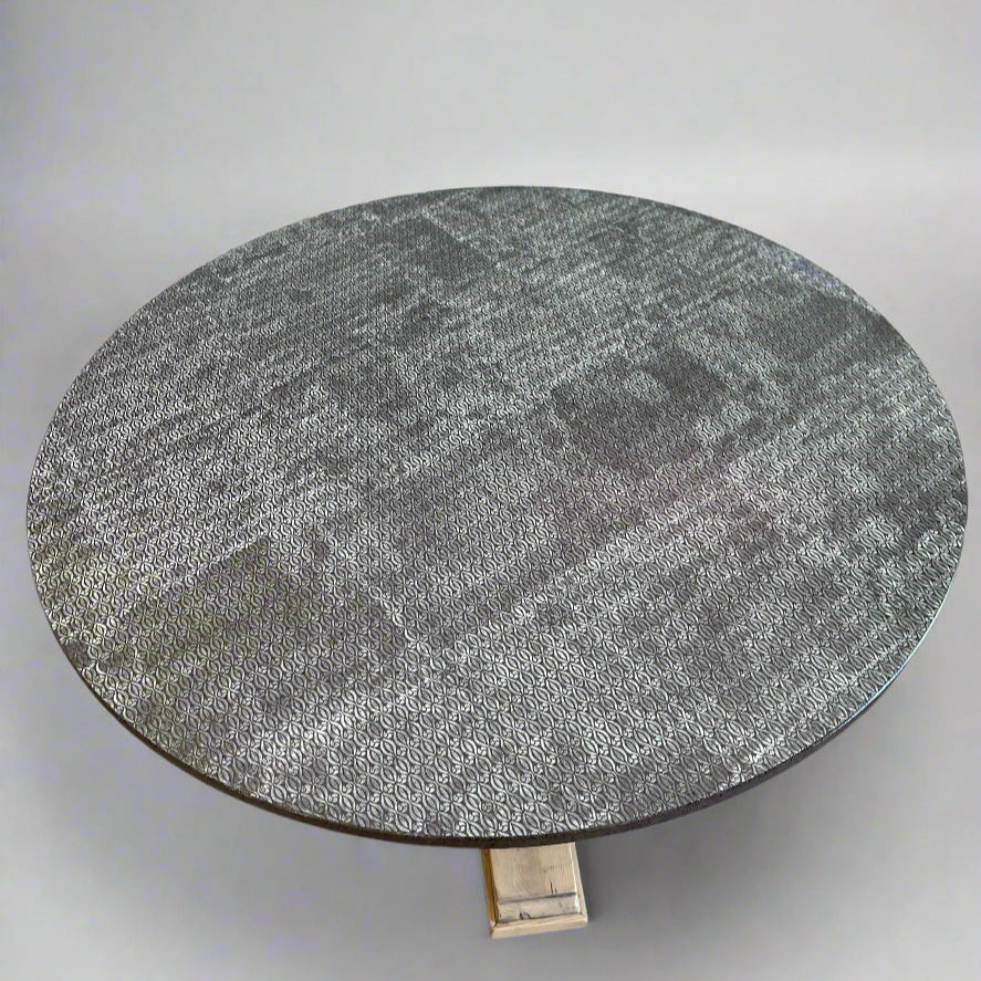 Round stone table on a plain background