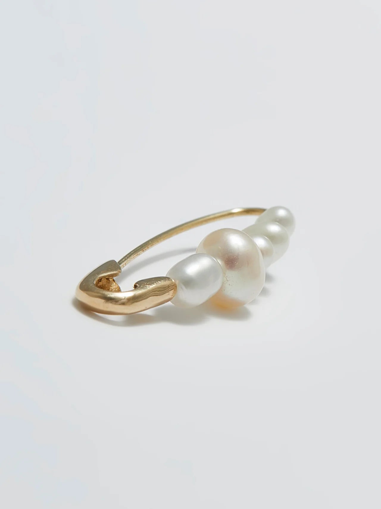 Loren Stewart Single Mixed Size Freshwater Pearl Safety Pin Earring 14kt.