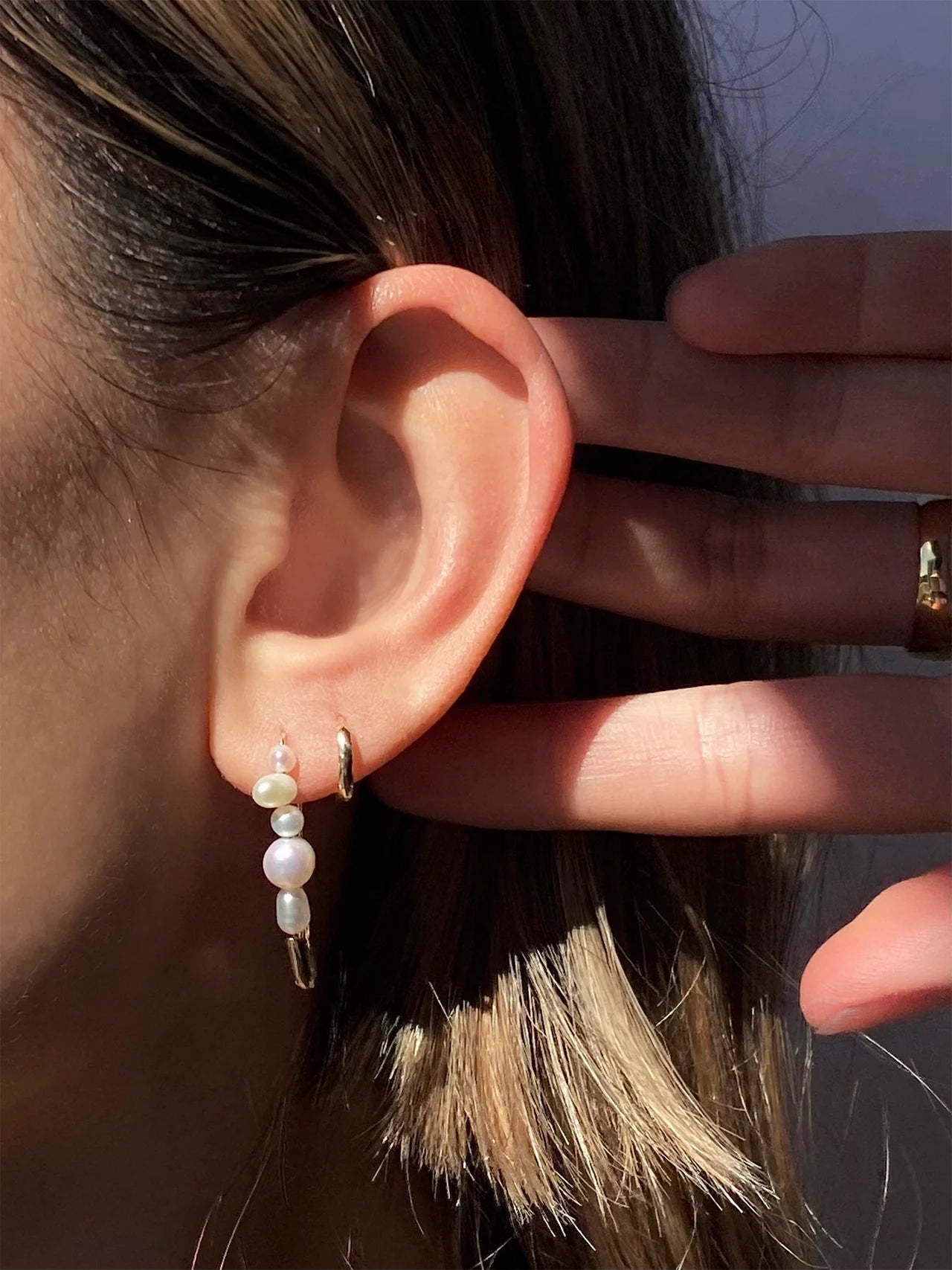 Loren Stewart Single Mixed Size Freshwater Pearl Safety Pin Earring 14kt.